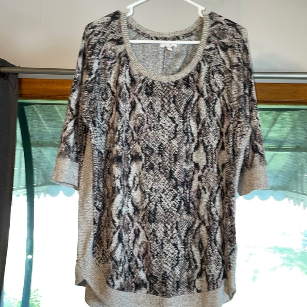 GUC women’s snake print sweater.